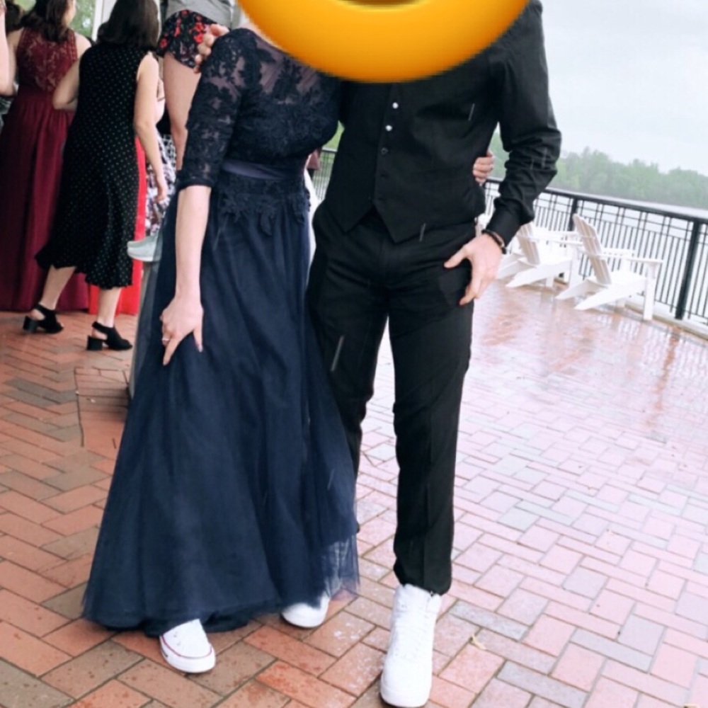 Blue tule and appliqué prom dress
